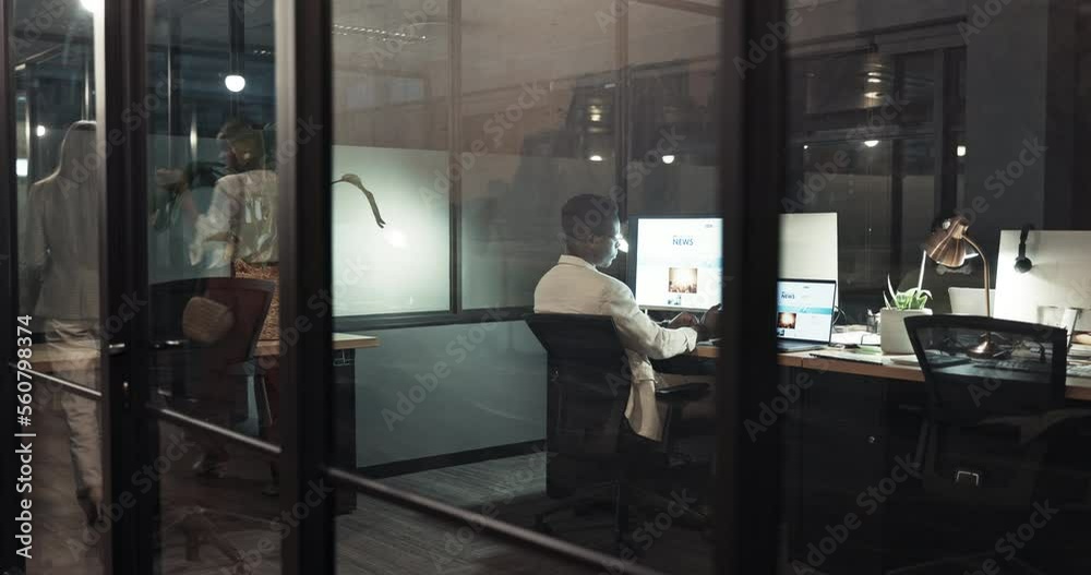 Poster computer, night and overtime with a business black man at work behind glass in an office on a deadli