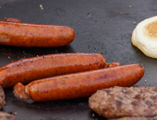 sausages on grill