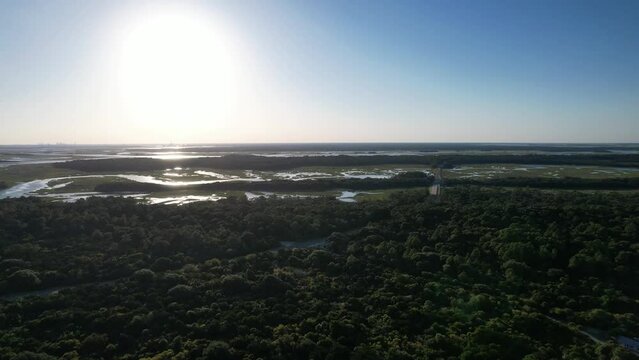 Sunshine over Florida marsh and ocean, aerial footage - Little Talbot, Florida