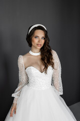 stylish caucasian bride in white wedding dress	