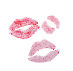 Fototapeta premium Red lipstick kiss marks on white background