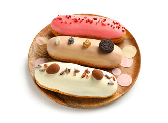 Plate with various glazed eclairs isolated on white background