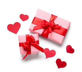 Gift boxes and paper hearts isolated on white background. Valentine's Day celebration