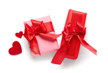 Gift boxes and paper hearts isolated on white background. Valentine's Day celebration