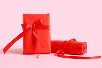 Beautiful gifts on pink background. Valentine's Day celebration