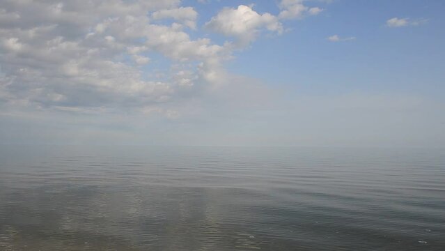 Sea and clouds and seagulls. Sea landscape.