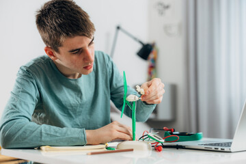High school student builds a windmill model at home