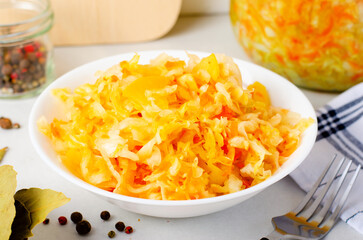 Sauerkraut, Shredded cabbage, apples, and carrots on bright rustic background, Fermented Food, Healthy Eating