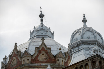 Fototapeta na wymiar Zinc covered domes on buildings in the center of Timisoara in Romania
