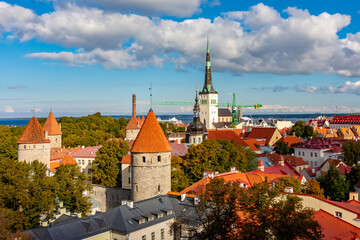 Fototapeta premium Tallinn cityscape with St. Olav's church (Oleviste kirik) and old town towers, Estonia