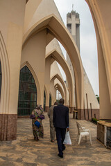 Exterior with arches, crosses, decorative walls of Catholics church in Abuja, church is known as The National Christian Centre (previously known as the National Ecumenical Centre) - obrazy, fototapety, plakaty