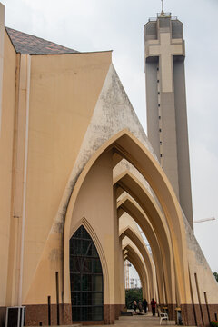 Exterior with arches, crosses, decorative walls of Catholics church in Abuja, church is known as The National Christian Centre (previously known as the National Ecumenical Centre)