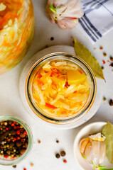 Sauerkraut, Shredded cabbage, apples, and carrots on bright rustic background, Fermented Food, Healthy Eating