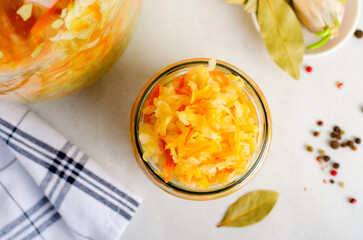 Sauerkraut, Shredded cabbage, apples, and carrots on bright rustic background, Fermented Food, Healthy Eating