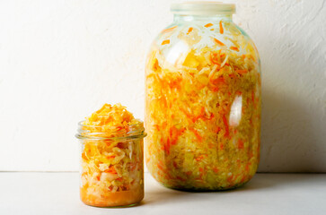 Sauerkraut, Shredded cabbage, apples, and carrots on bright rustic background, Fermented Food, Healthy Eating