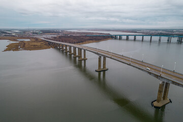 Long bridge over the water from an aerial view