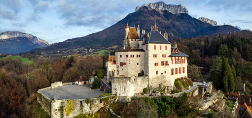 Most beautiful medieval castles of France - fairytale Menthon located near lake Annecy. aerial view