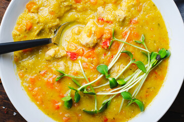 Lentil Soup, Homemade Vegetable Soup with Chicken and Herbs on Wooden Background, Healthy Eating