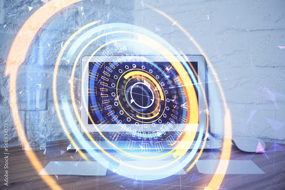 Poster computer on desktop in office with technology theme hologram. double exposure. tech concept.