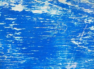 Blue abstract background with textures. Old paint on the board.