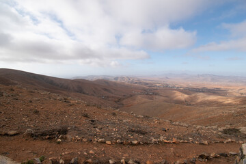 Desert landscape with mountains terraine. Caldera of an ancient volcano.