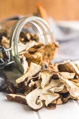 Sliced dried mushrooms in jar.