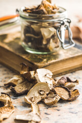 Sliced dried mushrooms  on kitchen table.