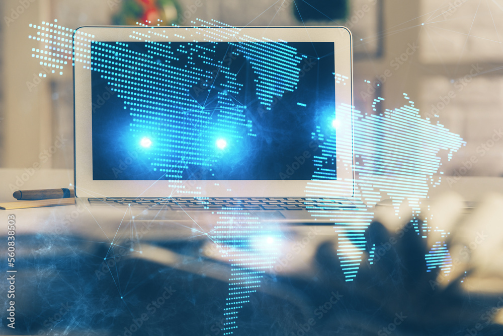 Aufkleber computer on desktop with social network hologram. multi exposure. concept of international people co