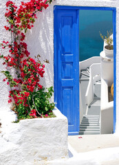 Traditional architecture of Oia village on Santorini island, Greece - 560840135
