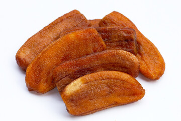 Sun dried bananas on white background.