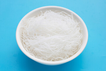 Vermicelli in white bowl on white background.