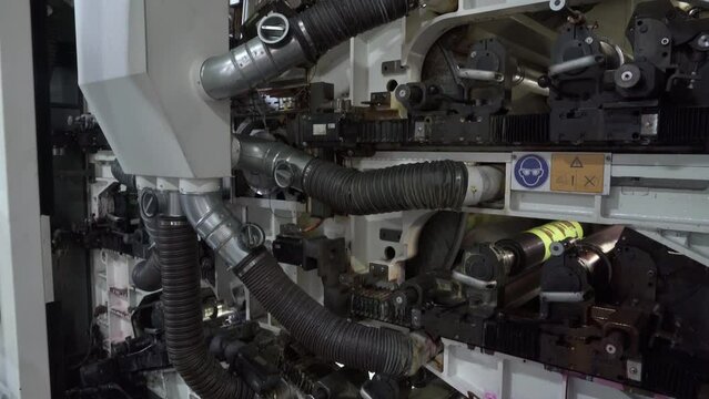 Anilox printing machine inside. Roll in paint rotates