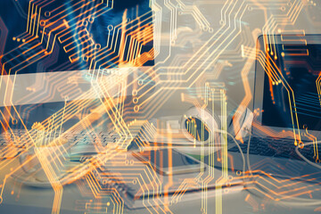 Computer on desktop in office with technology theme hologram. Multi exposure. Tech concept.