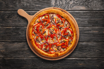 Pizza with mushrooms, red pepper, onion, corn, tomatoes