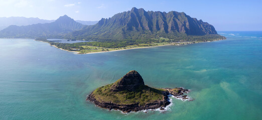 Panoramic aerial view of the Koolau Mountain Range on the east side of Oahu with Chinaman's Hat (Mokolii Island) in the foreground