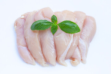 Raw chicken tenders on white background.