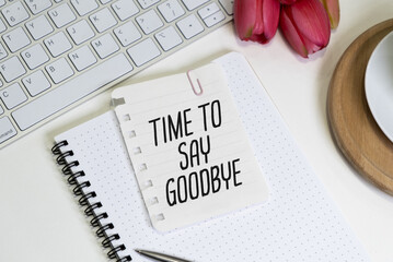 Time to Say Goodbye Text written on notebook page