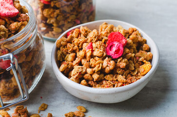 Granola with Dried Berries on Bright Concrete Background, Healthy Vegan Snack or Breakfast