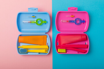 Oral care.Travel set with a toothbrush, toothbrush and toothpaste in a case.Composition on a textural bright background. Dentist concept. Flat lay. copy space.Place for text
