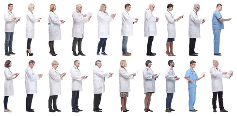 Obraz premium group of doctors with clipboard isolated on white