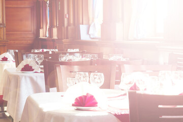 Photo of an empty banquet hall, close-up details, glare effect
