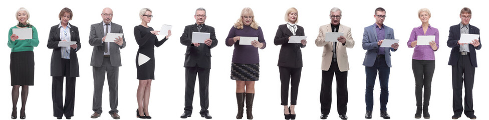 group of people holding tablet and looking into it