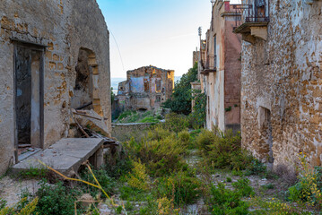 Poggioreale is a ghost town in the west of Sicily. The Belice Valley earthquake destroyed the entire town and killed 200 people in 1968. Shrubs overgrown the ruins today