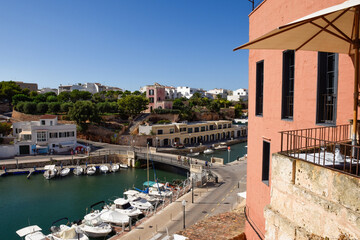 Fototapeta na wymiar Scenic view over historic marina in a port town know for travel and tourism
