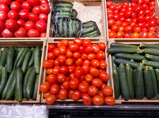 buying vegetables(cucumbers, tomatoes, onions, peppers, eggplant, zucchini) at the market