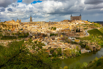 Fototapeta na wymiar Photo of Toledo with view of Alcazar and Cathedral of Saint Mary, Castilla-La Mancha, Spain.