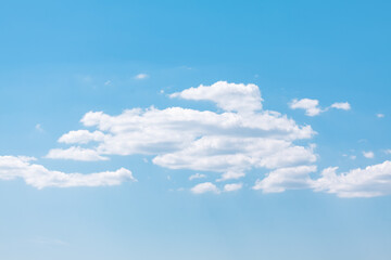Blue background sky with clouds . Sunny summer day sky 