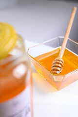 Fresh honey on clean background