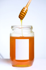 Fresh honey on clean background