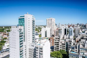 Foto op Plexiglas View of Buenos Aires from above. Cityscape architecture, houses and roofs of areas of Buenos Aires, Argentina. © uladzimirzuyeu